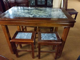 Chinese real marble counter top table with 4 chairs.