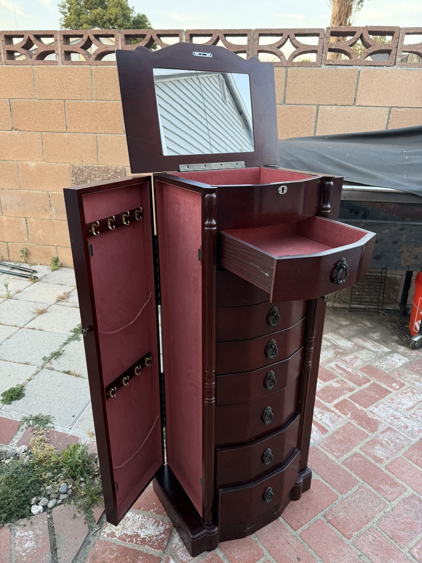 tall wooden jewelry armoire 