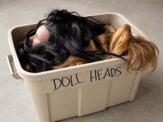 Tub of Assorted Cosmetology Mannequin Heads