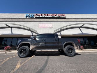 GMC SIERRA DENALI AT4 wheels tires leveling and lift kits accessories lights side steps bed covers intakes installations. Alignments. (we Finance)