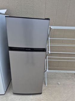 Mid size Gray Frigidaire refrigerator