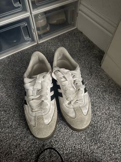 Two shoes adidas