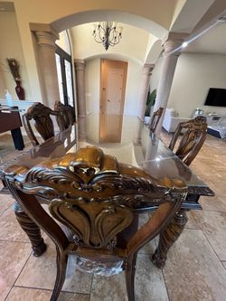 Wood table with 5 chairs.