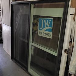 58x57 new construction window,dark brown outside,white inside,one only$350 cash or zelle