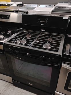 Estufa de gas negra WHIRLPOOL con parrilla