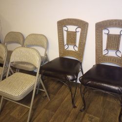 4 Cast Iron & 4 Folding Chairs