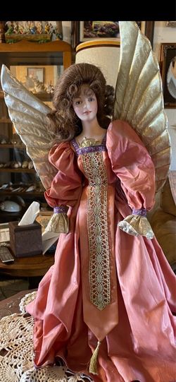 Beautiful vintage Maryse Nicole collectible porcelain angel doll, approximately 20 inches tall. She features a stunning rose-pink satin gown with eleg