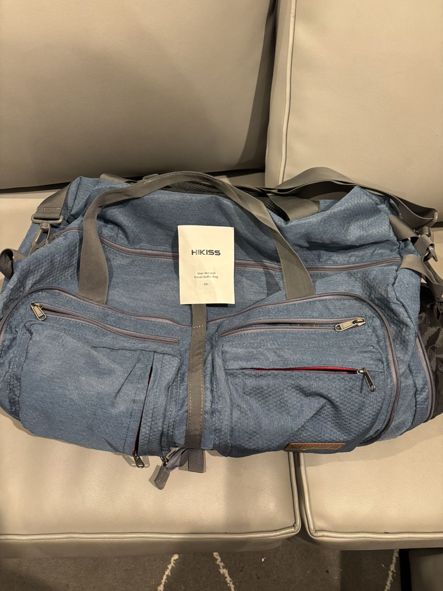 Used Like New Hikiss 65L Foldable Travel Duffel Bag Waterproof