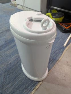 Ubbi diaper pail. Used but good condition. White color