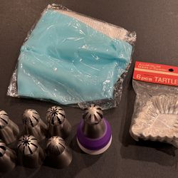 Icing Tips & bags plus vintage aluminum Tartlet molds.