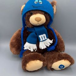 M&M's World brown bear plush stuffed animals with blue hats and scarves.  