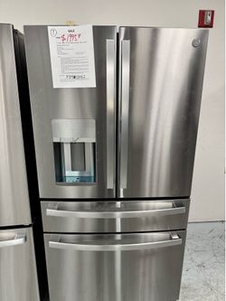 GE Profile 4-door refrigerator with convert drawer and LED Light wall