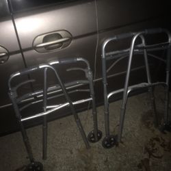 Like new adjustable fold up Walkers only $25 each