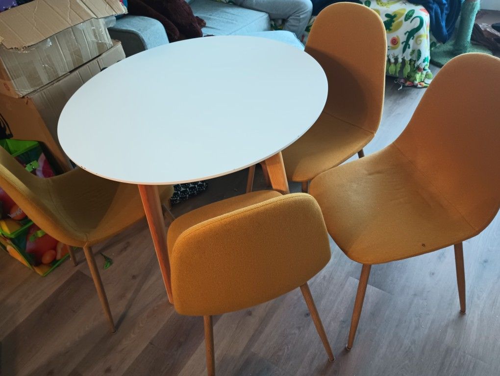 Table With Four (4) Yellow Chairs