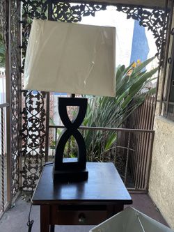 2 Lamps And Small Table