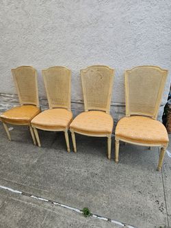 4 vintage cane back chairs