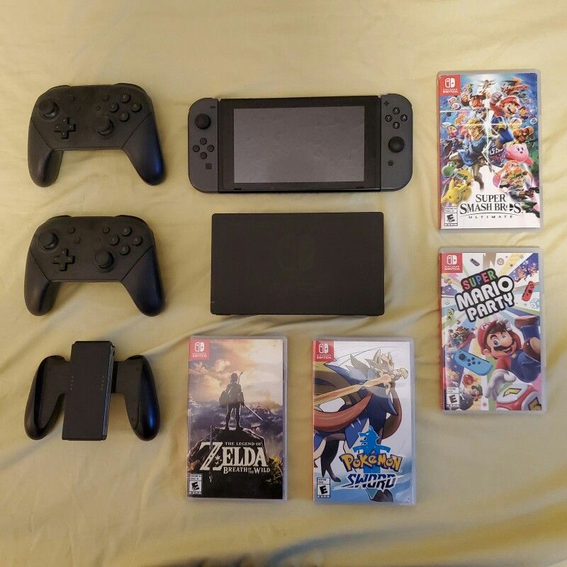 Nintendo Switch w/ 5 Games 2 Pro Control
