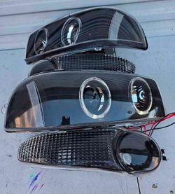 01-06 Gmc Sierra Yukon Headlights Luces
Micas Calaveras Faros Faroles Focos
Headlamps
