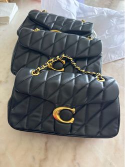 Black kilted, leather, gold, and black