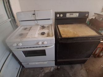 Two free ovens. One is gas and is fitted to use propane tanks. The other is electric used for powder coating wheels and engine parts.