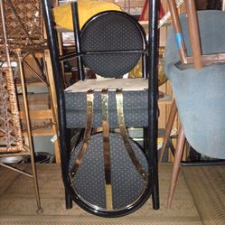 X2 black and gold cushion chairs