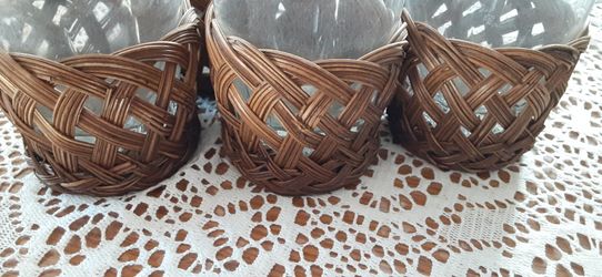 Vintage glasses with rattan glass holders. Very unique!