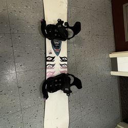 Snowboard With Bindings And Helmet