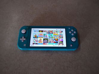 NINTENDO SWITCH LITE with 7000 GAMES