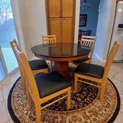 Kitchen  table with  5 chairs  and brand new rug