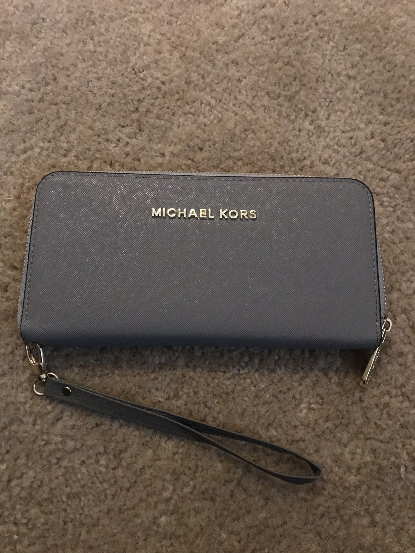 Michael kors zip around wallet brand new.