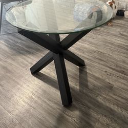 Round glass coffee table