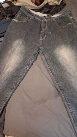 Mens like new pants size 38x34 by infamous raider, does have light stain in back of pants  towards bottom