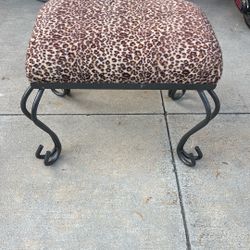 Cushioned animal print ottoman/footstool