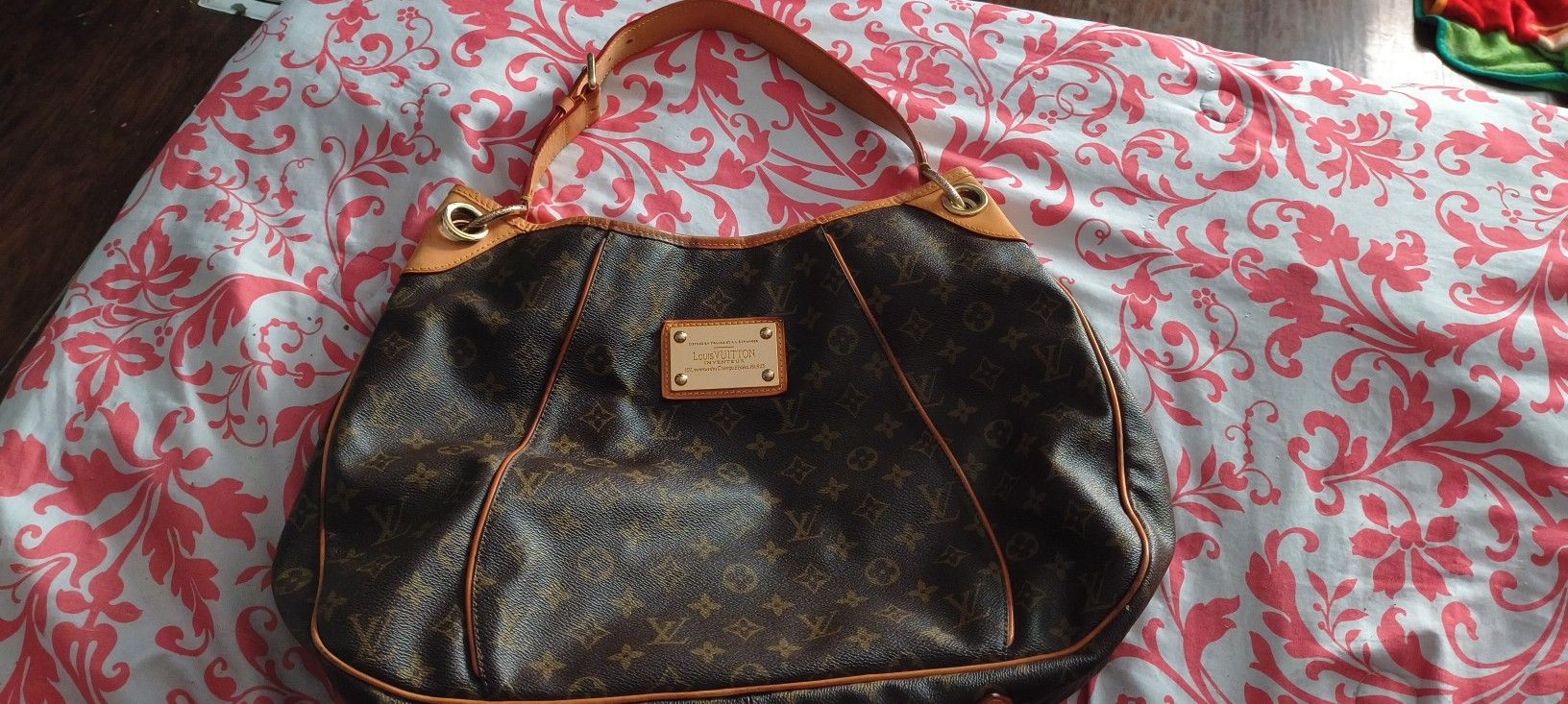 Louis Vuitton Monogram Canvas Galliera PM bag a gold-tone "Louis Vuitton Inventeur" plate on a vachetta leather trim