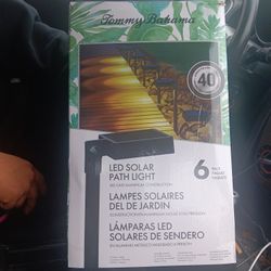 6-pack of Tommy Bahama 40-Lumen Solar LED Path Lights.