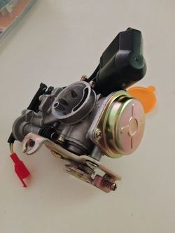49/60 cc carburetor Japan CVK labeled.