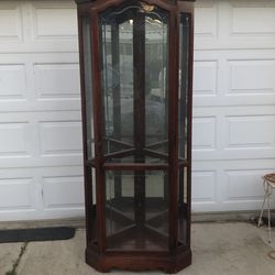 Howard Miller 680-249 corner curio cherrywood cabinet