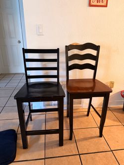 black & brown high chairs