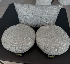 SET OF 3 “SPARKLES HOME” DECORATIVE PILLOWS. TAGS OFF, BUT NEVER USED. $120 FOR ALL 3 OR $45 EACH.