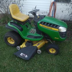 JD 140 48" riding mower / huskies push mower