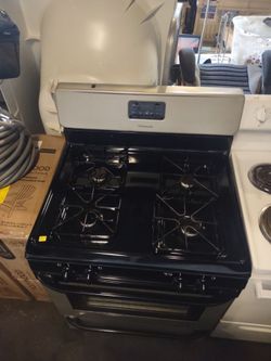 Back and  stainless steelFrigidaire gas stove working great condition