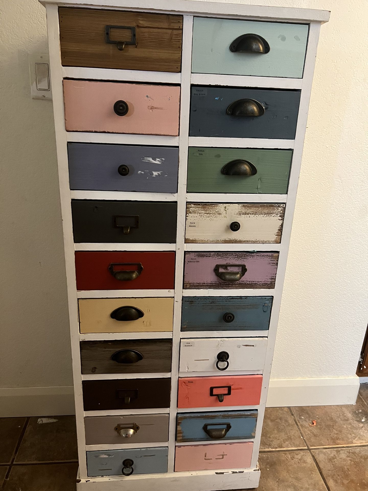 White Cabinet With Colorful Drawers