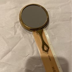 Vintage solid brass two-sided mirror one side magnifying 4 1/2 inches tall perfect for traveling or in purse