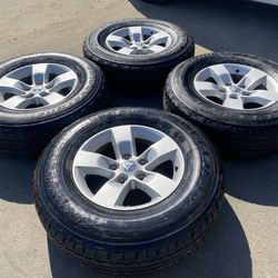 Factory 17” Dodge Ram 1500 5 Lug Rims & Bridgestone Tires   