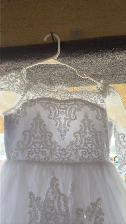 never been worn first communion dress for young girl have two left these are valued at $180
