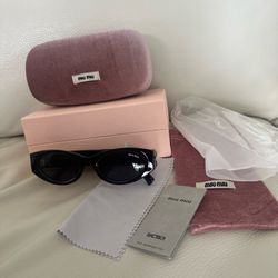 MIU MIU Women's Black Oval Oversized Sunglasses