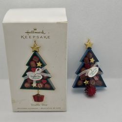 Hallmark Keepsake Ornament Truffle Tree 2009 Chocolate Candy Truffle Tree W Box

Brand new Ornament,  never displayed 
Box has some storage wear and s