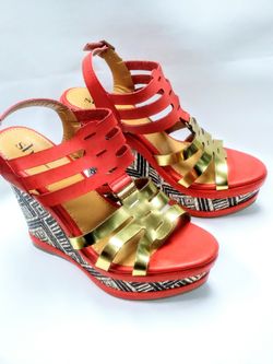 Orange wedge sandals Sz 7.5