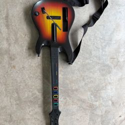 Two Wii Guitars And Dance Pad 