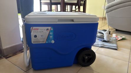 Manguera nueva y nevera Coleman nueva